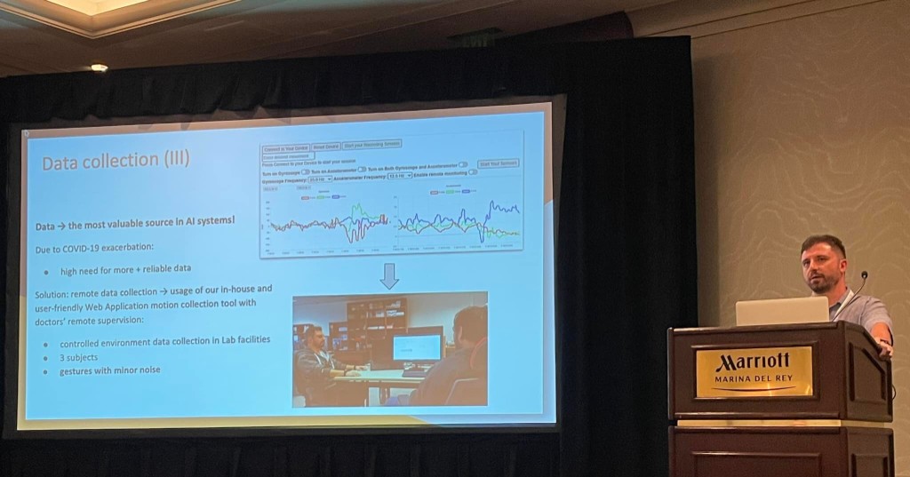 Pantelis Tzamalis presenting at a conference; slide on data collection for AI systems (Marriott Marina del Rey)